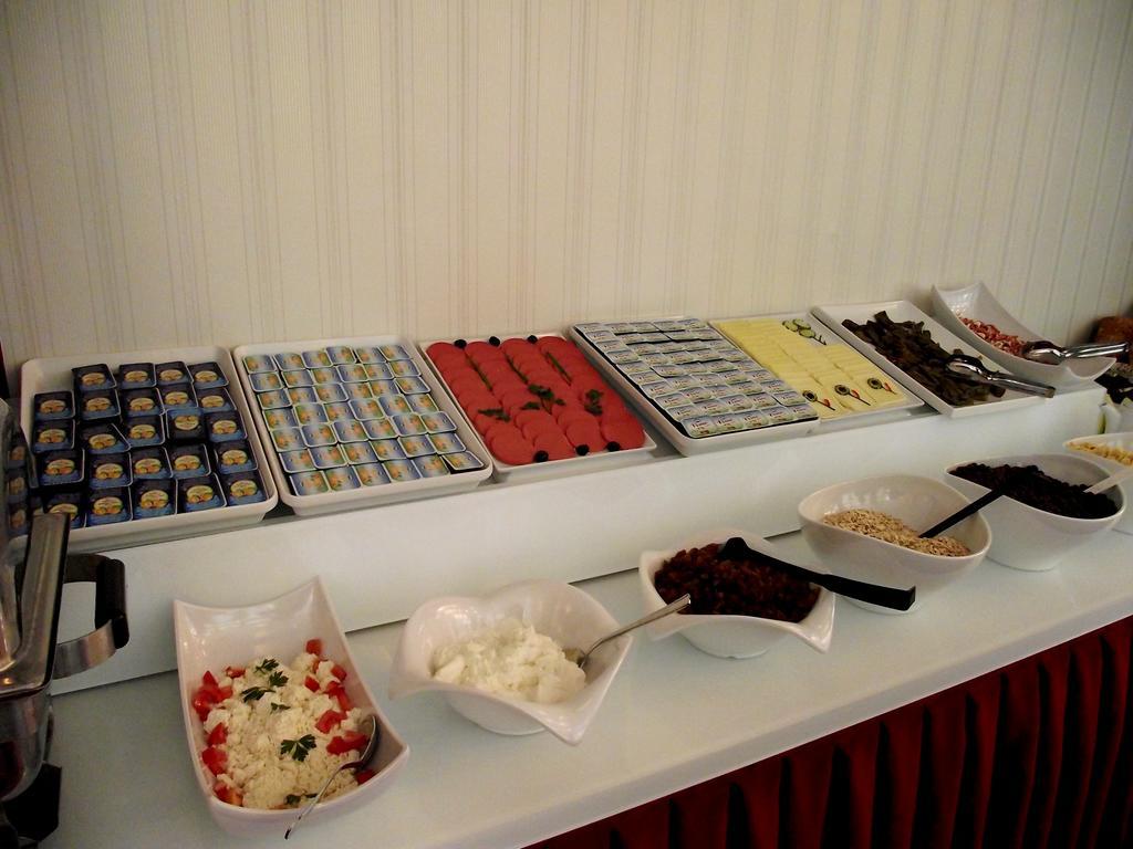 Akman Hotel คูซาดาซี ภายนอก รูปภาพ