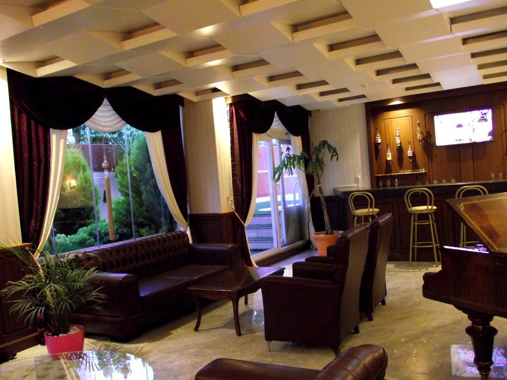 Akman Hotel คูซาดาซี ภายนอก รูปภาพ