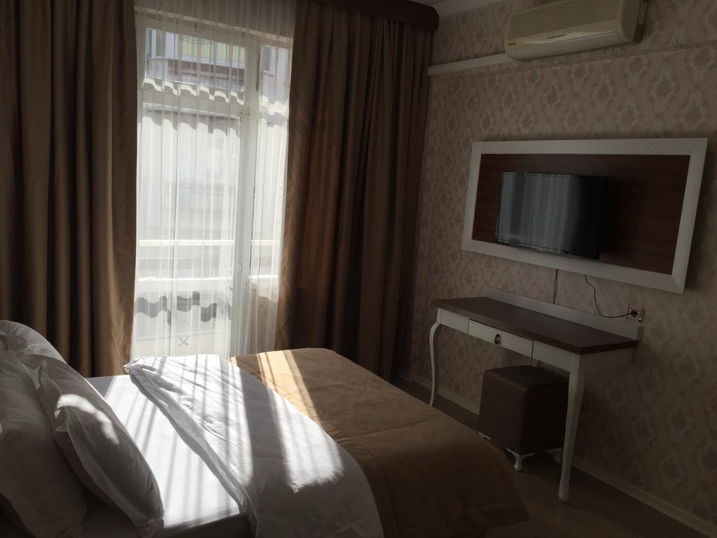 Akman Hotel คูซาดาซี ห้อง รูปภาพ