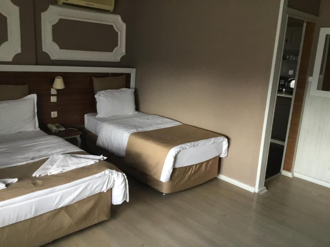 Akman Hotel คูซาดาซี ภายนอก รูปภาพ
