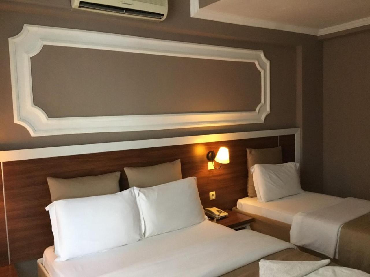 Akman Hotel คูซาดาซี ภายนอก รูปภาพ