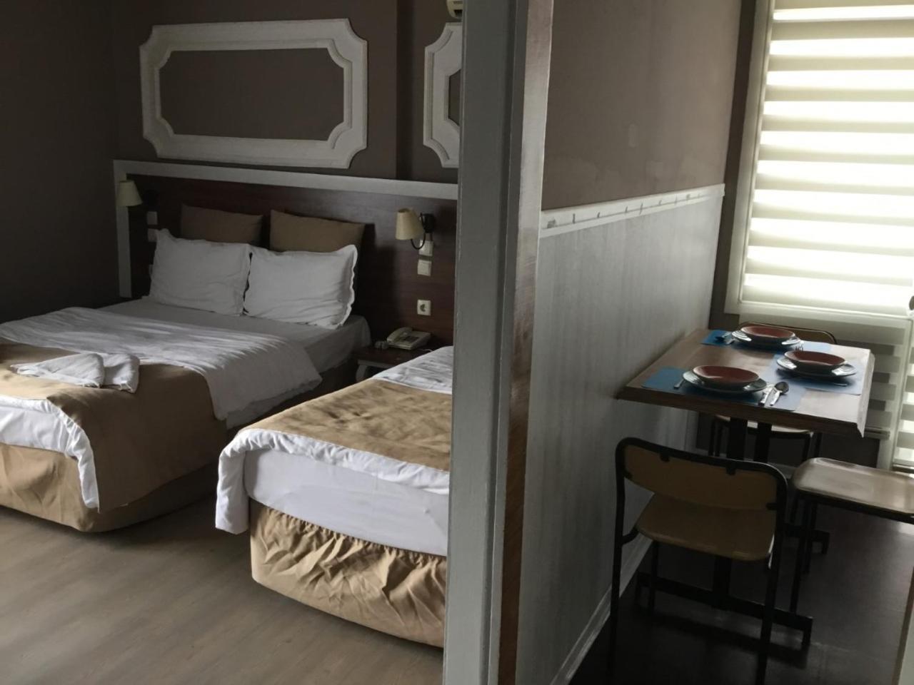 Akman Hotel คูซาดาซี ภายนอก รูปภาพ