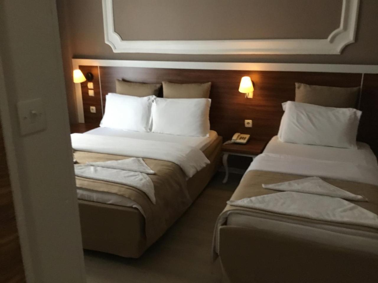 Akman Hotel คูซาดาซี ภายนอก รูปภาพ