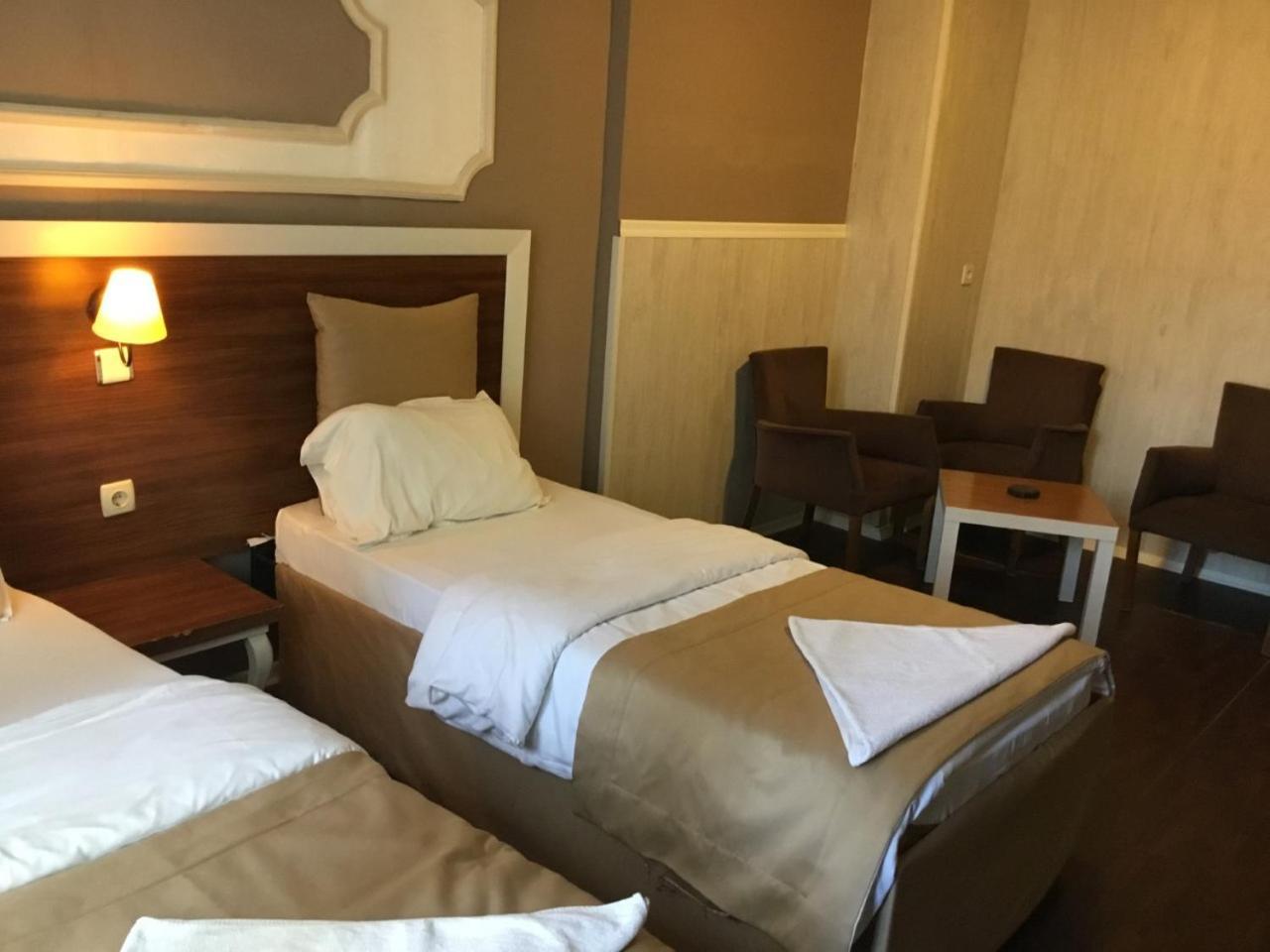 Akman Hotel คูซาดาซี ภายนอก รูปภาพ
