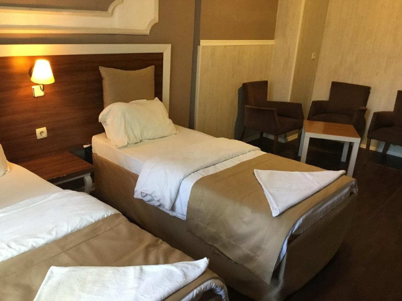 Akman Hotel คูซาดาซี ภายนอก รูปภาพ