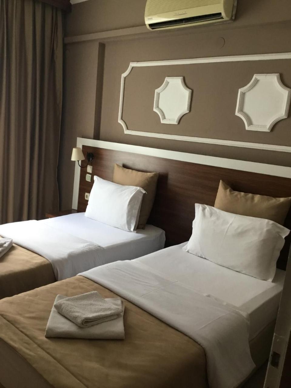 Akman Hotel คูซาดาซี ภายนอก รูปภาพ