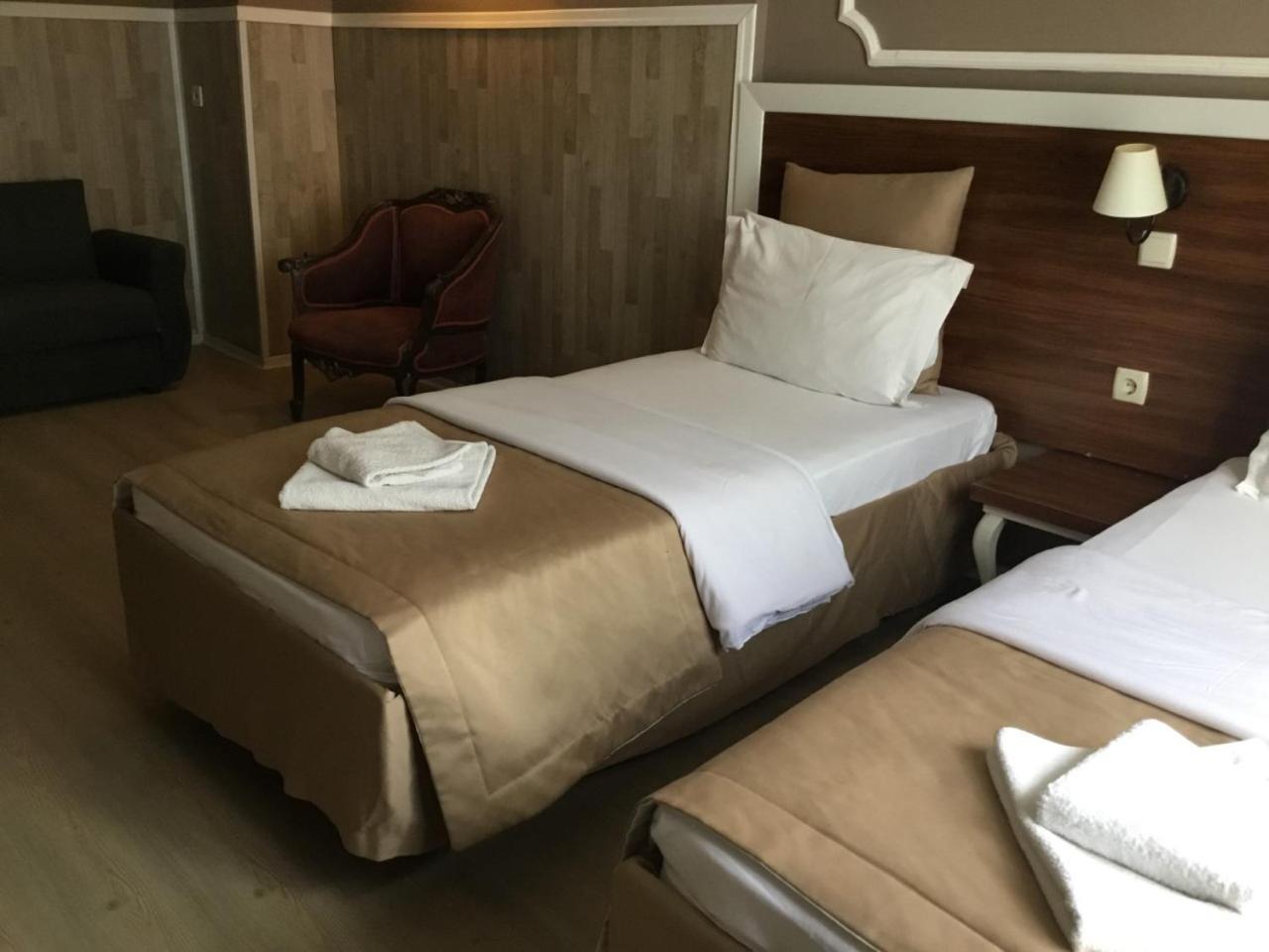 Akman Hotel คูซาดาซี ภายนอก รูปภาพ