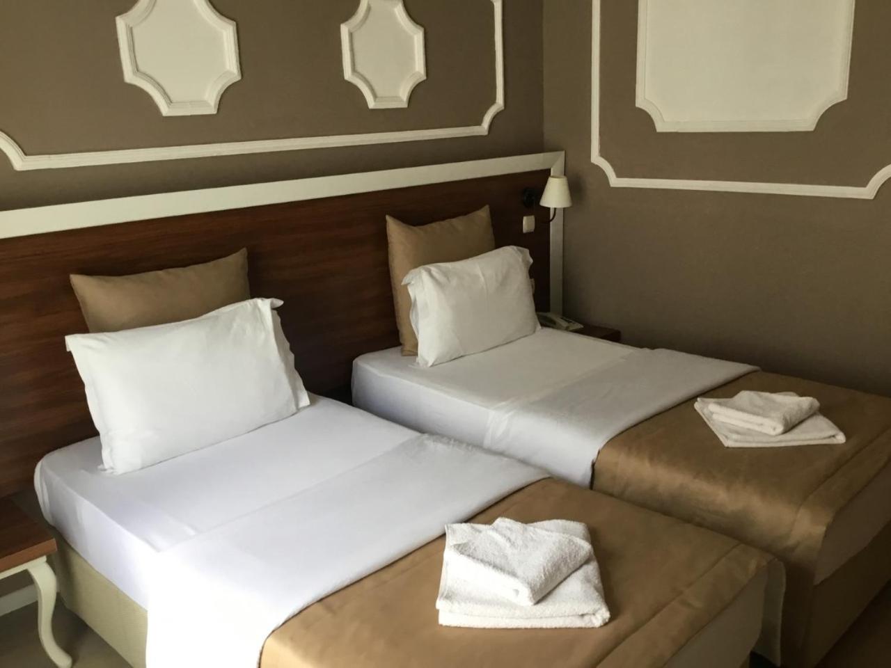 Akman Hotel คูซาดาซี ภายนอก รูปภาพ