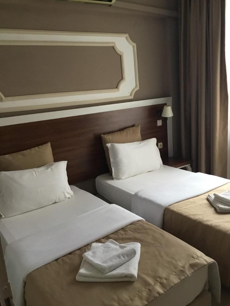 Akman Hotel คูซาดาซี ภายนอก รูปภาพ